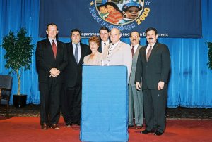 Andrew Smith, Jean Bauman, David C. Lewhoff, William Sentner, and Leonard L. Nowak and  Receiving Simply the Best Award