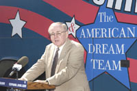 [Photo 1: Mr. John Weicher speaking at the Colorado Housing Assistance]