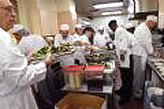 [Photo 2: Kitchen activity]