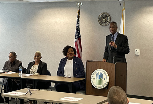 [HUD Great Plains Regional Administrator Ulysses Clayborn (far right) opens up the panel presentation at the 2024 Women's History Month event on Tuesday, March 19, 2024. He is joined by panelists (L-R) Jennifer Tidwell of the Health Forward Foundation, Kymberly Daniels formerly of the city of Kansas City, Missouri's WBE/DBE Certification Office and Melissa Robinson, current 3rd District Councilwoman for the city of Kansas City, Missouri (Photo credit: HUD Great Plains)]