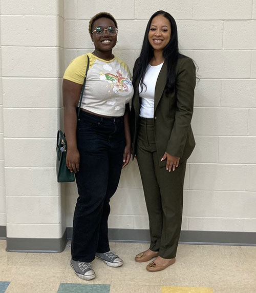 [HUD Deputy Regional Administrator Tiffany Cobb pictured with tenant Azariah Bryant.]
