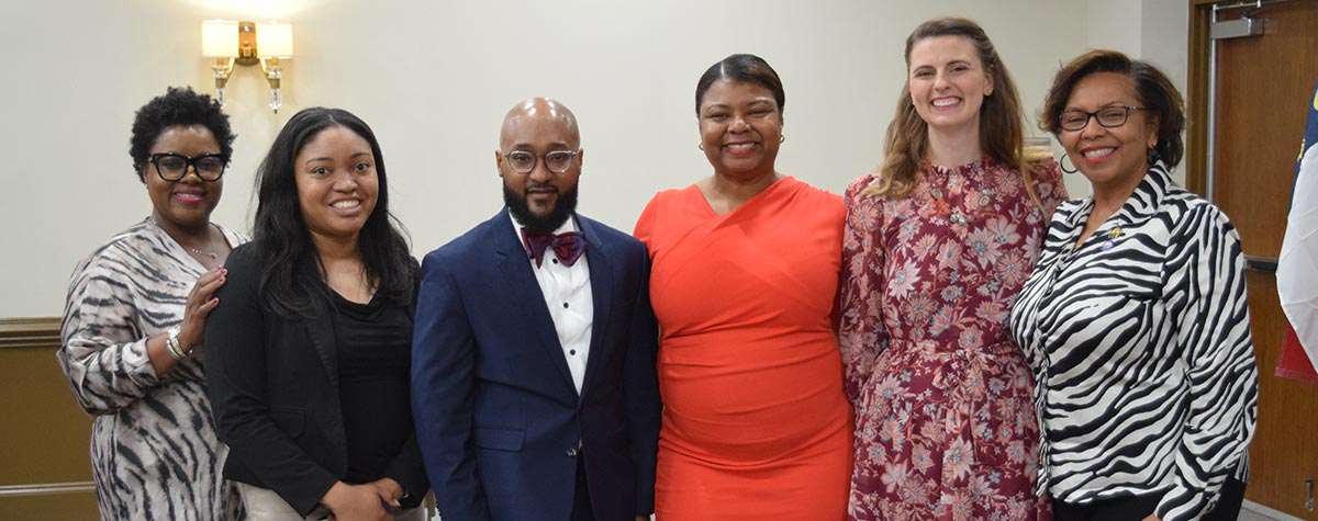 [North Carolina Field Office Director, Lorenzo Claxton with Raleigh Association of REALTORS® current President Teresa Pitt, past President Leslie Williams, HUD CPD Representative Alyssa Rouse, HUD Equal Opportunity Specialist Caitlin Humphreys, and GPIC Chair Monique Edwards.]