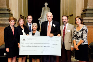 [Photo: Officials at grant ceremony]