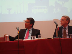 [Photo 2: Regional Administrator Rick Garcia and Terry Rosapep, from Department of Transportation (DOT), listen to speaker]