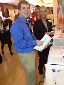 [Photo: Suzanne Wright assisting UT Student]