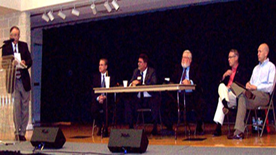[Photo 1: Richard McClain, Executive Director of the John City Housing Authority; Chuck Mason,  Eastern Eight CDC, Steve Baldwin, Johnson City Community Development Director;   Howard Roberts, Construction Analyst HUD Knoxville, Erik Hogland, HUD Community Plan Development, Ed Ellis, HUD Moderator at the podium]