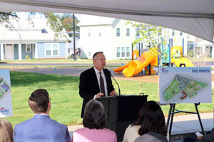 [Photo 2: Five Points 3 - Bob Cook, Knoxville Field Office Director, recognizes the achievement of the City of Knoxville, KCDC and community leaders and partners in making Five Points 3 a reality.]
