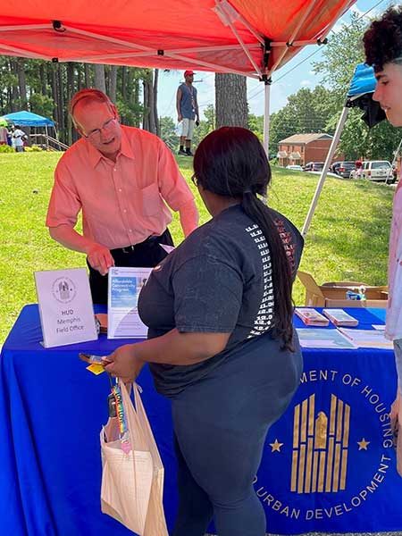 [Educating families about the Affordable Connectivity Program was in full-swing on July 12 in Jackson Tennessee. With the start of the school year upcoming, one-time discounts of up to $100 for a laptop, desktop computer or tablet were of interest to parents who qualify for the Affordable Connectivity Program. Walter Perry, Memphis Field Office Director, shares information at the 2023 Family Empowerment Expo sponsored by the Jackson Housing Authority. ]