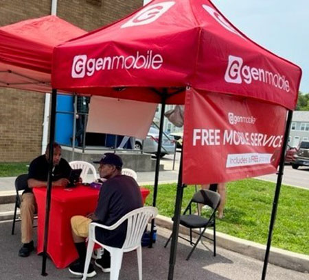 [At Knoxville Tennessee's Five Points Public Housing Community, cellular providers were on-site to sign-up residents for the Affordable Connectivity Program.]