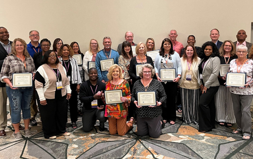 [Kentucky and Tennessee HUD Region IV teammates joined forces to share the latest information on HUD Programs with PHA professionals at the Kentucky Housing Association/Tennessee Association of Housing and Redevelopment Authorities annual training conference. Pictured (l to r) from Tennessee: Tajuanya Carr, Calin Goolsby, Walter Perry, and Demetria Daniel; and from Kentucky: Emelie Lima-Alguire, Kristina Messina, and Kimberly Gillis.]