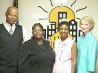 [Photo: Robert Lipscomb and Yvonne Leander congratulate Tammie Davis and Martha Brown