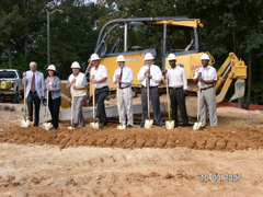 [Photo: Officials at the ground breaking]