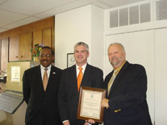 [Photo 1: Nashville HUD Field Office Director, William Dirl (l), Sen. Lamar Alexander Field Representative, Michael Shulz, and Trevecca Towers Management Agent, Ron Jones.]