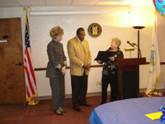 [Photo 4: Faye Reid and Nancy Greif, show their appreciation and recognize Bill's dedication to support single family programs]