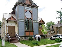 [Photo 4: The Appleton CDBG staff posing in front of the Houdini historic site]