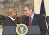 [Photo of President Bush and Secretary Alphonso Jackson at the podium]