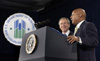 [Photo: President Bush and Secretary Jackson at the podium]