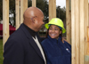 [Photo: Secretary Jackson with Raven Simone at the 2006 NBA All Star Operation Home Delivery with Habitat for Humanity in Houston Texas]