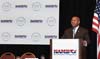 [Photo: Secretary Jackson at the podium addressing the NAMB in D.C]