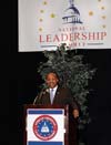 [Photo: Secretary Jackson at the podium in D.C]