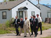 [Photo: Secretary Jackson with Congressman Brady and local officials]