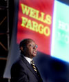 [Photo: Secretary Jackson at the 2006 Wells Fargo Home Mortgage Housing Symposium.]