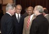 [Photo: Secretary at a meeting at the Homeles Council at the White House]