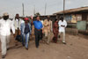 [Photo: Secretary Jackson touring the Ashaiman Tulaku Community in Accra, Ghana]