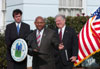 [Photo: Secretary Jackson, Mayor Brett Warr and Mississippi Governor Haley]