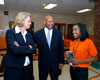 [Photo: HUD Secretary Jackson and Education Secretary Spellings present a book to the librarian at the Humes Middle School in Memphis, TN]