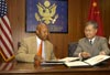 [Photo: HUD Secretary Jackson in meetings with the Chinese Minister of construction Guangtao Wang sign agreement at HUD, 8/30/07]